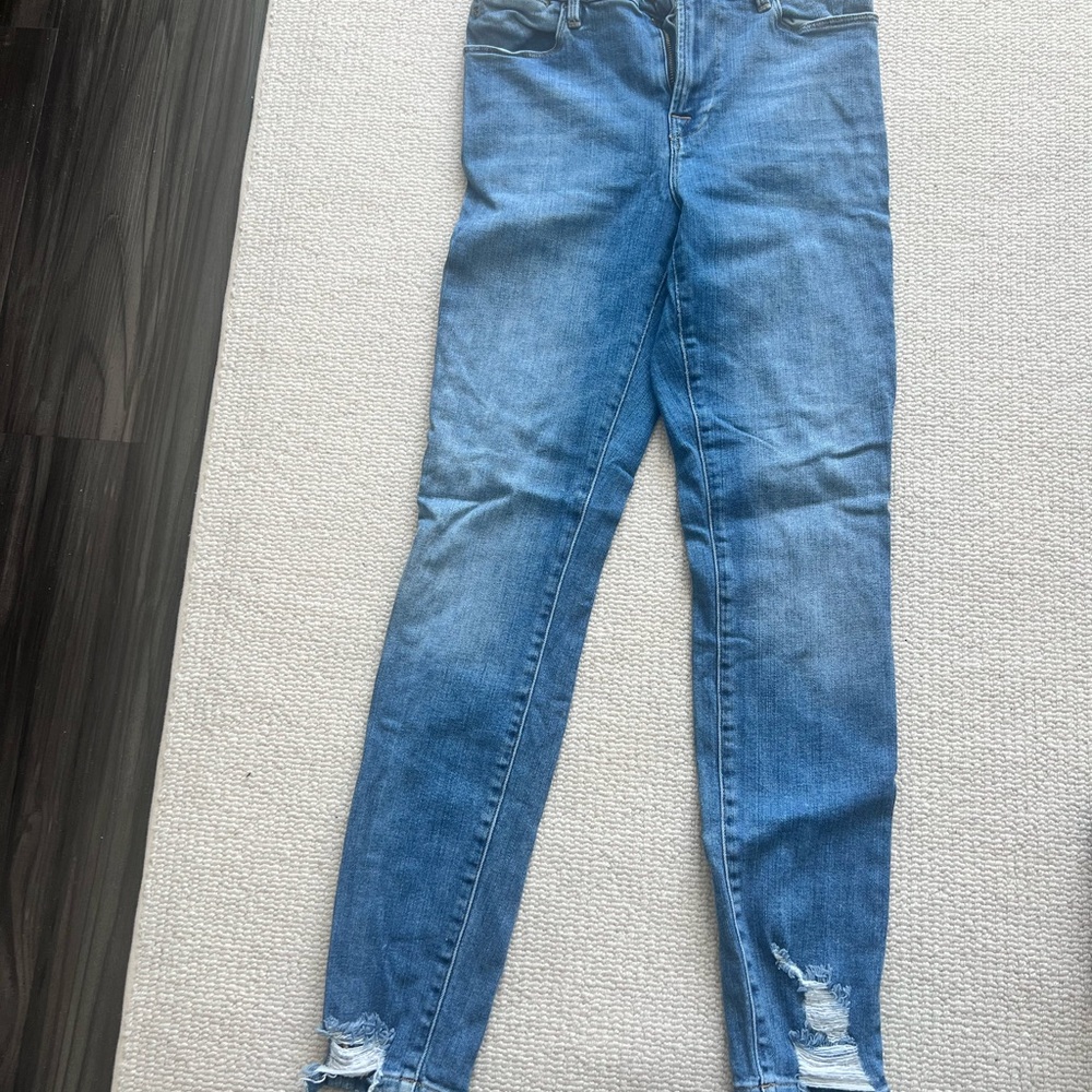 Frame Denim Blue Skinny Jeans with Distressed Hem